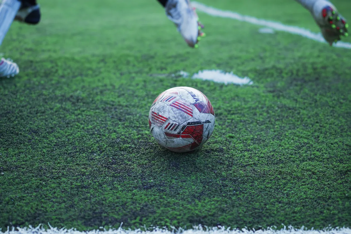 Football on a field in Gurugram illustrating the football category